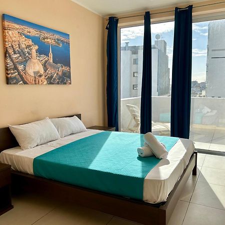 Hotel Malta Paradise Central Accomodation à San Ġiljan Extérieur photo